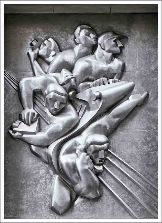 News is an Art Deco sculpture above the entrance to 50 Rockefeller Plaza.