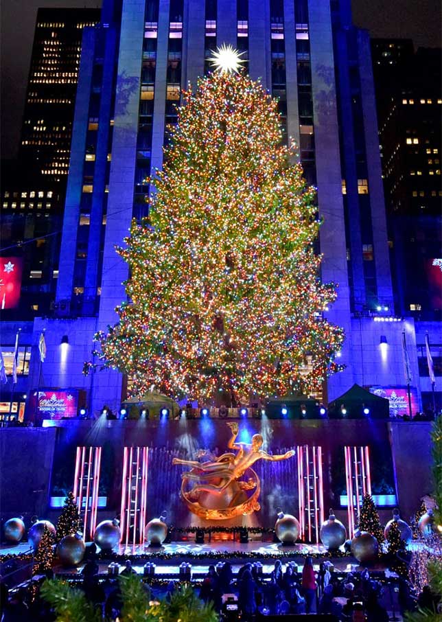 The famous Rockefeller Center Christmas Tree and Prometheus scupture by The Rink.